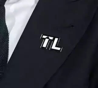 What is TL badge?